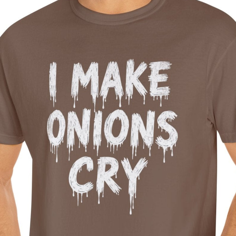 Man wearing a brown t-shirt with 'I MAKE ONIONS CRY' text on a white background