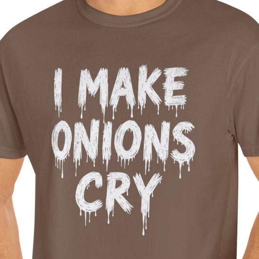 Man wearing a brown t-shirt with 'I MAKE ONIONS CRY' text on a white background