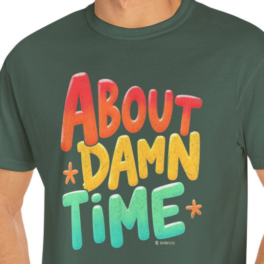 Man wearing a green t-shirt with colorful text on a white background